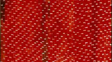 Painting features vertical tile-shaped brushstrokes in various shades of red separated by horizontal white lines. Creating a rhythmic and mosaic-like pattern that resembles stitching, the white lines create stairsteps in the lower right corner, separating as they move towards the center.