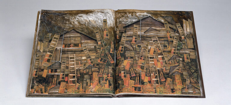 An open book displays an intricate collage of layered wooden houses and ladders arranged in a dense, overlapping composition that spans both pages. The background is neutral and unadorned.