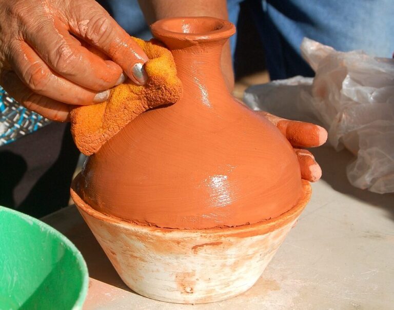 Learning to build pottery with coils (2011) by Jami Porter Lara