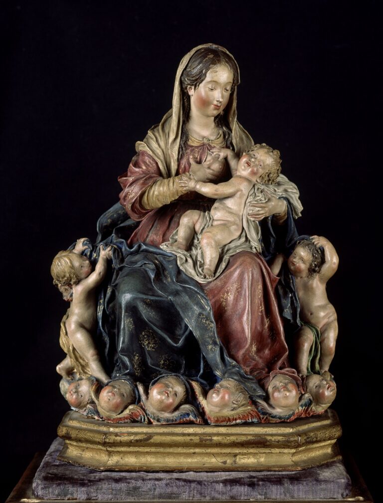 Luisa Roldan (La Roldana), Nursing Madonna, 17th century; Painted terracotta, 15 in. high; Private Collection, Madrid; Photograph: Album/Art Resource, NY